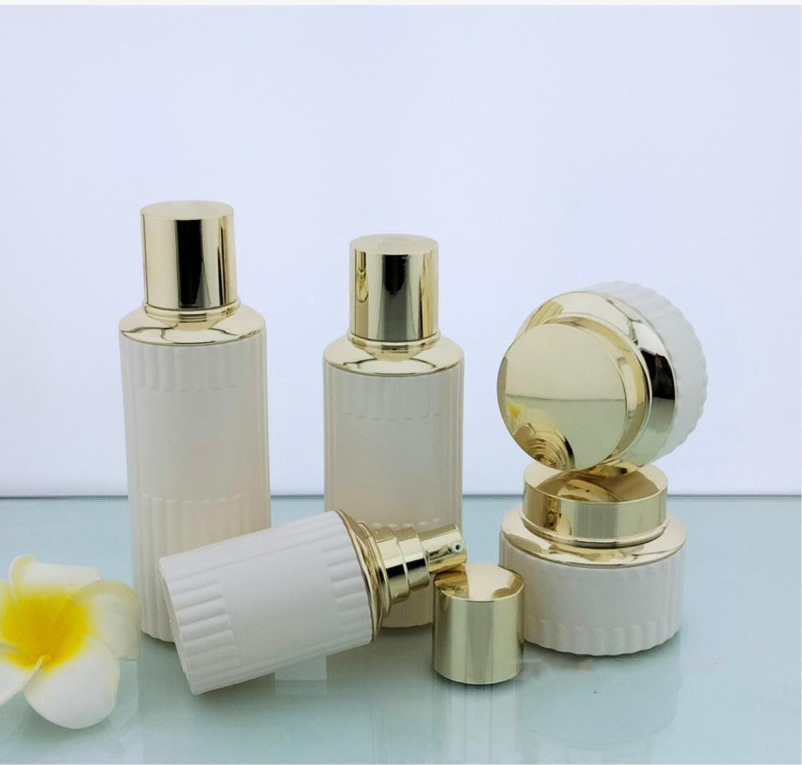 2024 Luxury opal white cosmetic glass package round cosmetic glass bottles&jars with gold lid wholdsale