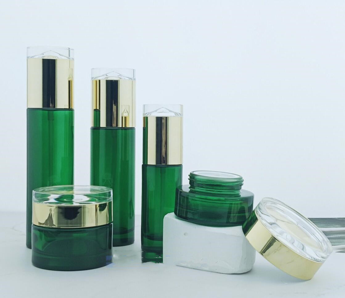 luxury package green cosmetic glass bottle cream jar with diamond lid wholesale