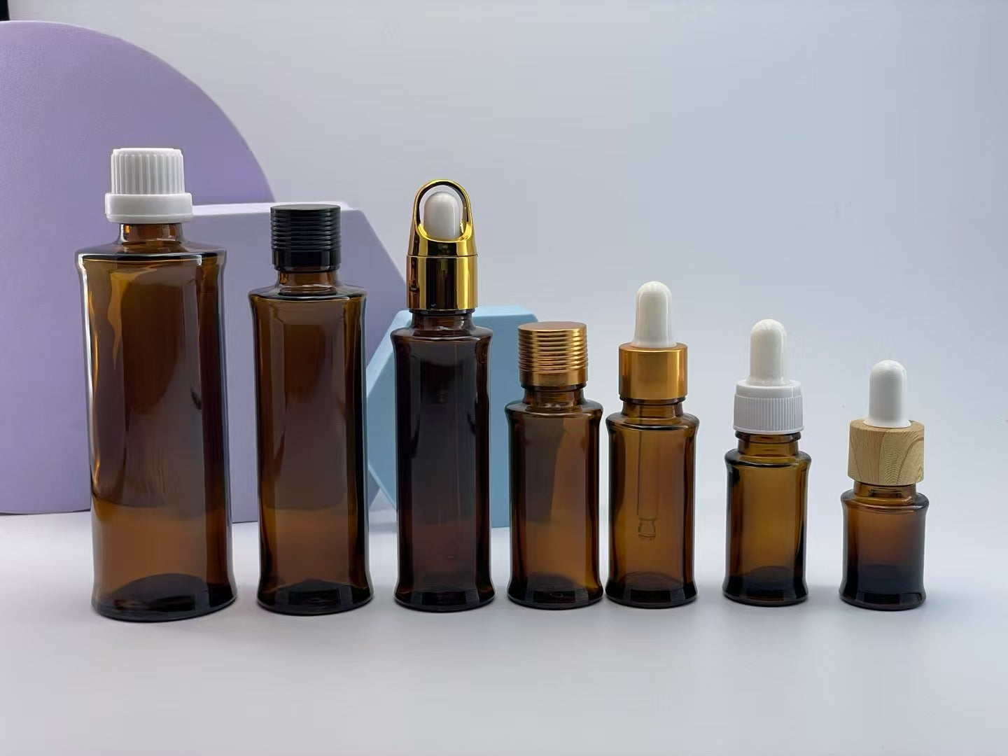 2025 high quality new style empty amber glass essential oil bottle with dropper/lid cosmetic glass package