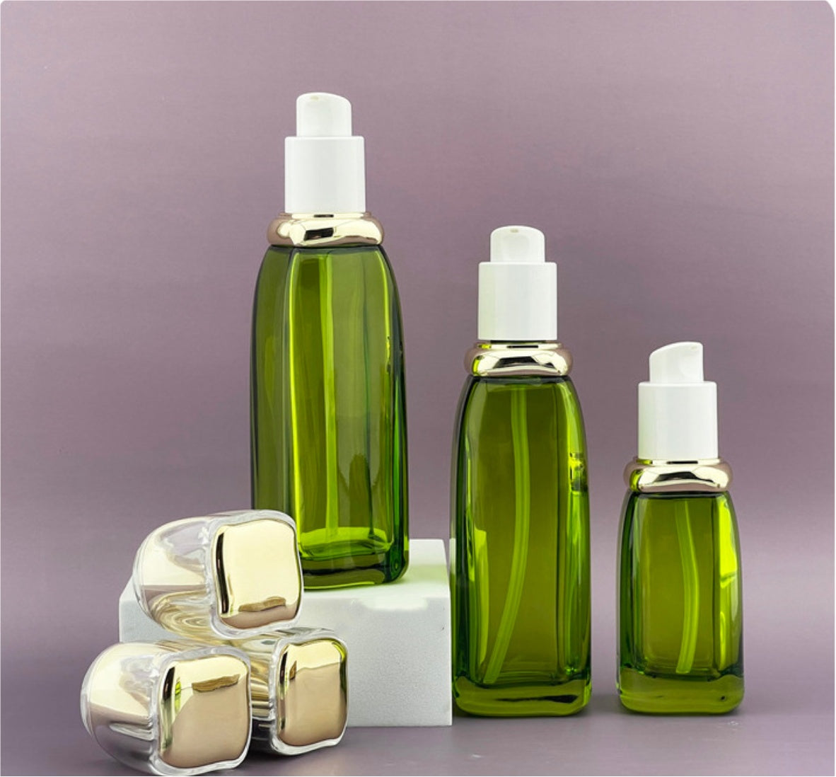 high quality luxury new style empty cosmetic green&nbsp; glass lotion bottles with press pump cosmetic bottles set skin care package&nbsp;