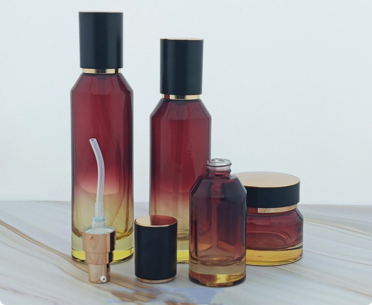 high quality luxury red colour cosmetic glass bottles slant cosmetic glass package with lid wholesale