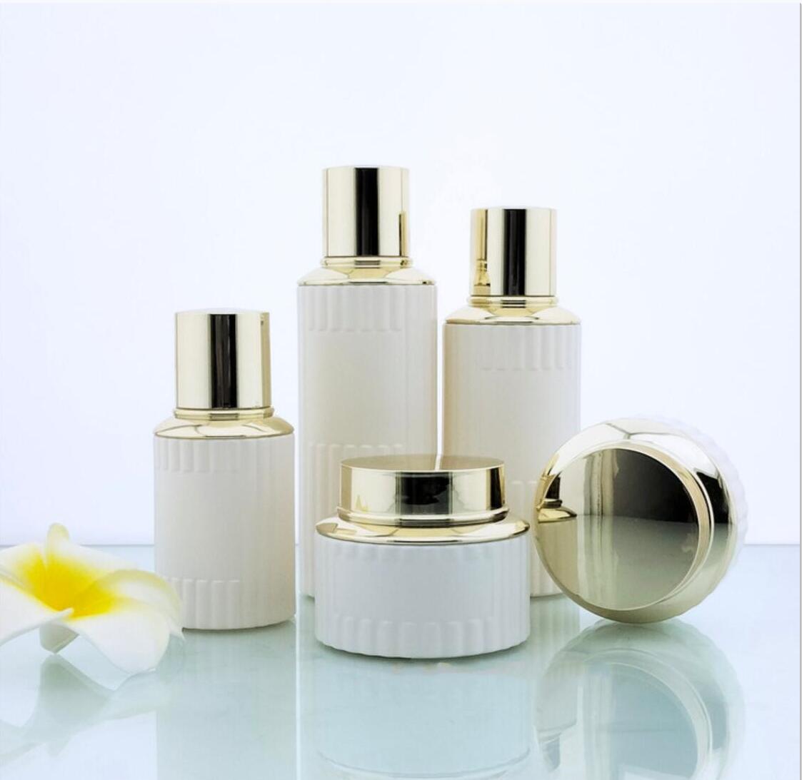 2024 Luxury opal white cosmetic glass package round cosmetic glass bottles&jars with gold lid wholdsale