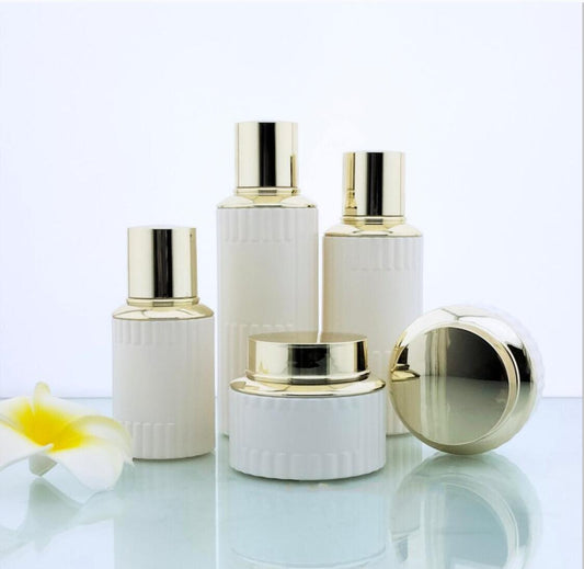 2024 Luxury opal white cosmetic glass package round cosmetic glass bottles&jars with gold lid wholdsale