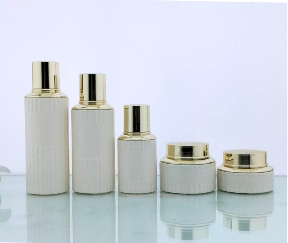 2024 Luxury opal white cosmetic glass package round cosmetic glass bottles&jars with gold lid wholdsale
