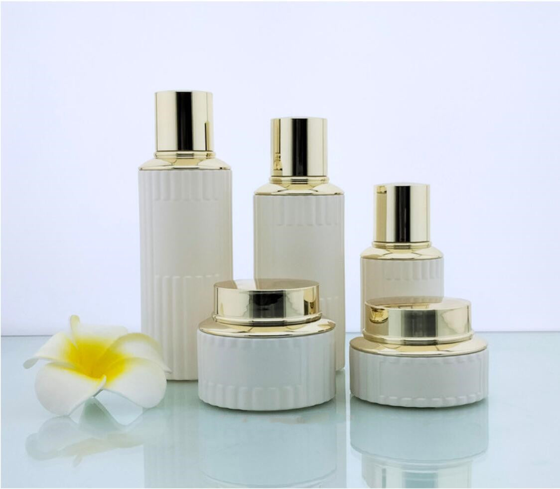 2024 Luxury opal white cosmetic glass package round cosmetic glass bottles&jars with gold lid wholdsale