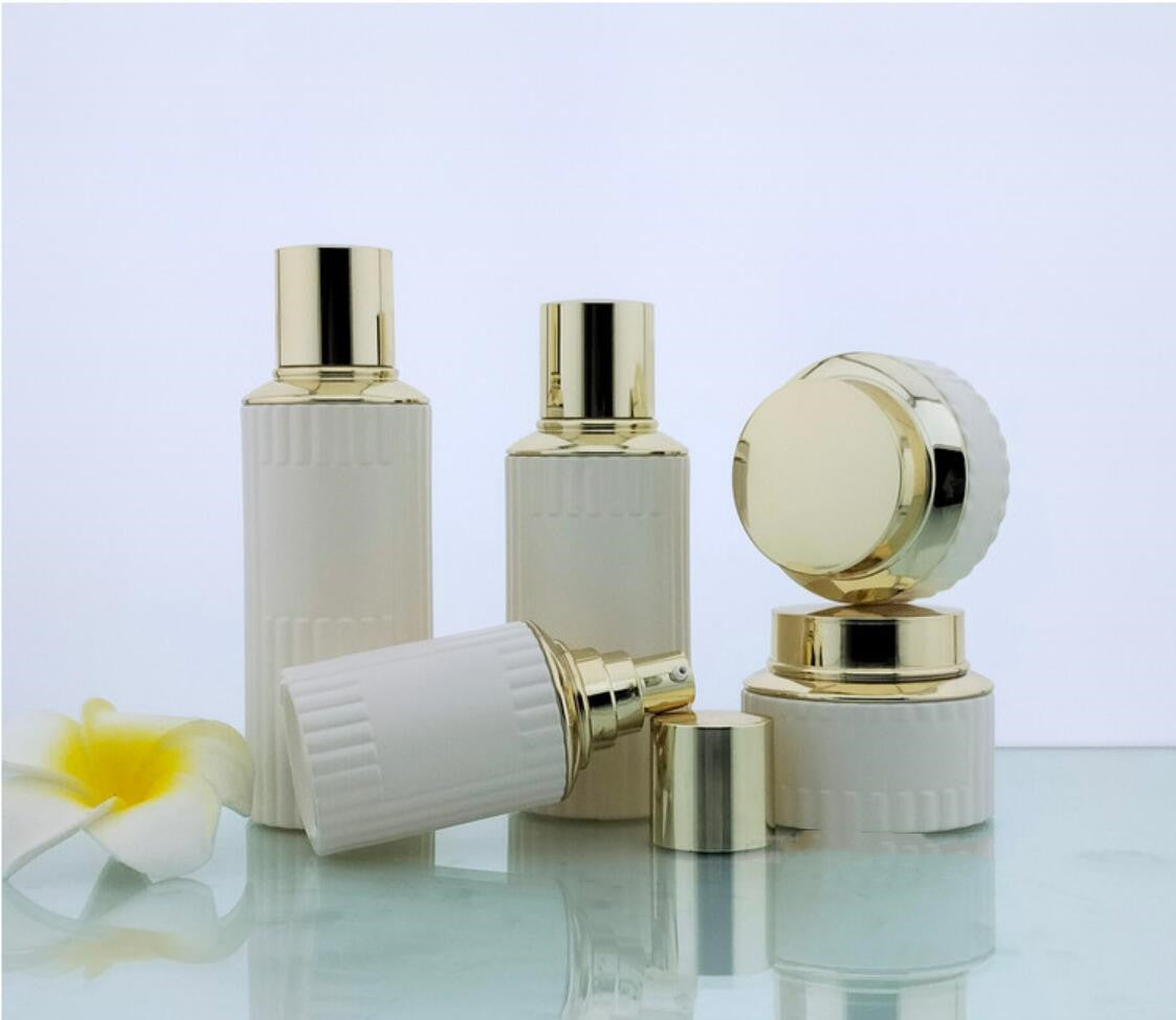 2024 Luxury opal white cosmetic glass package round cosmetic glass bottles&jars with gold lid wholdsale