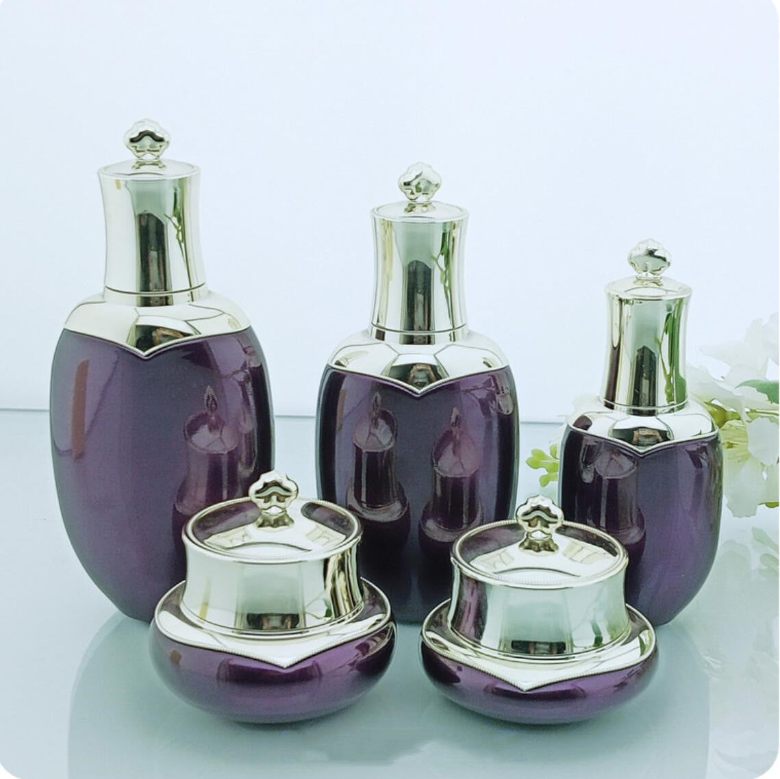 Luxury skincare packaging 30g 50g 40ml 100ml 120ml clear glass serum lotion bottles and face cream jars set with silver cap
