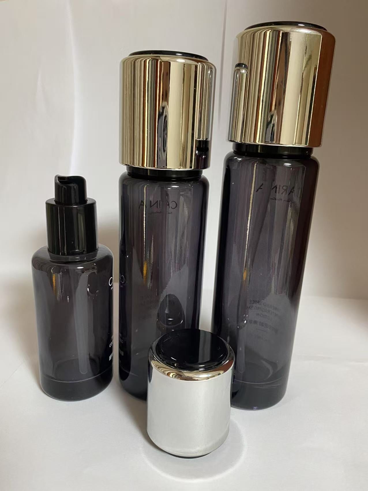 high quality empty black cosmetic glass lotion bottle cosmetic cream jar with lid wholesale