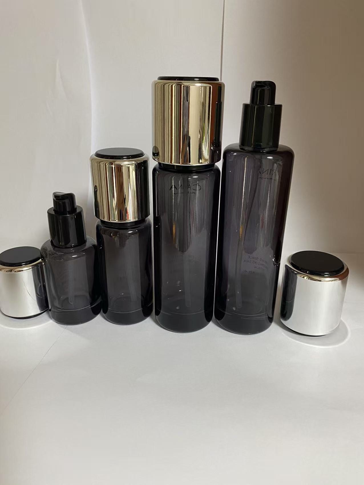 high quality empty black cosmetic glass lotion bottle cosmetic cream jar with lid wholesale