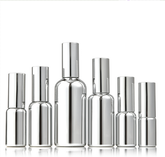2025 high quality empty glass essential oil bottle silver cosmetic glass spray bottle wholesale
