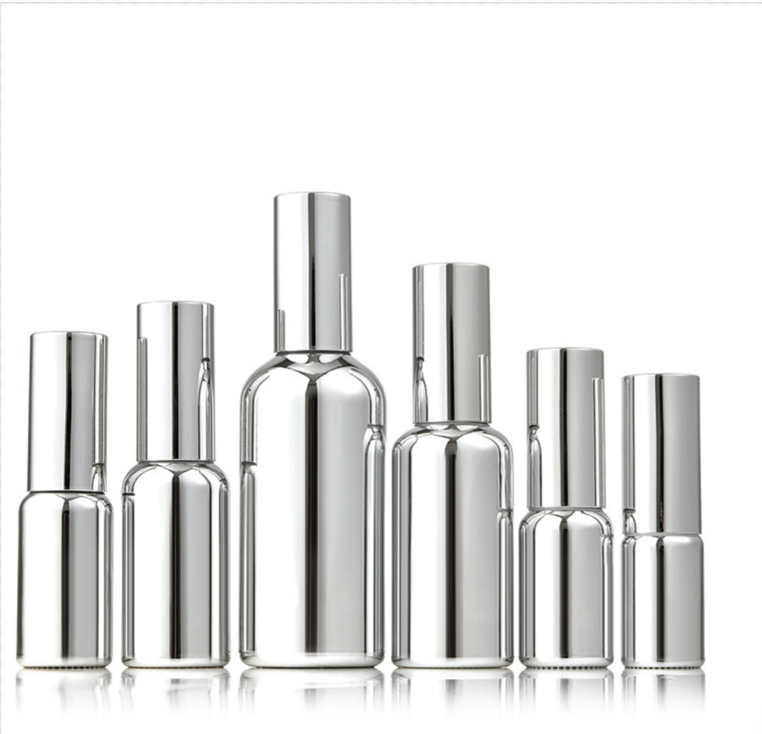 2025 high quality empty glass essential oil bottle silver cosmetic glass spray bottle wholesale