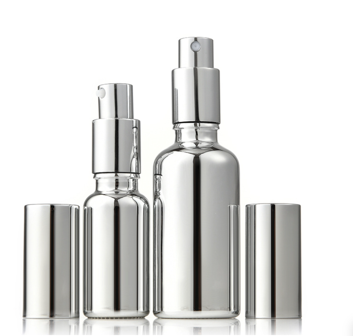 2025 high quality empty glass essential oil bottle silver cosmetic glass spray bottle wholesale