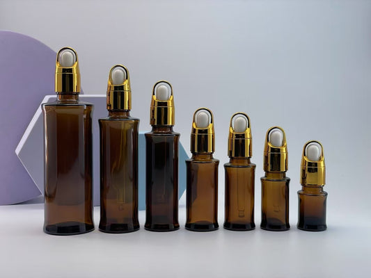 2025 high quality new style empty amber glass essential oil bottle with dropper/lid cosmetic glass package