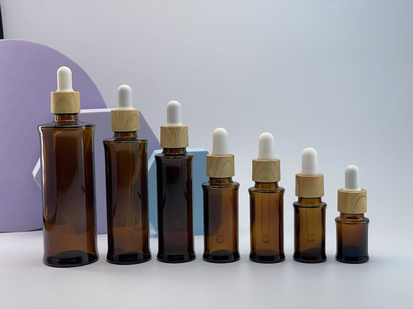 2025 high quality new style empty amber glass essential oil bottle with dropper/lid cosmetic glass package